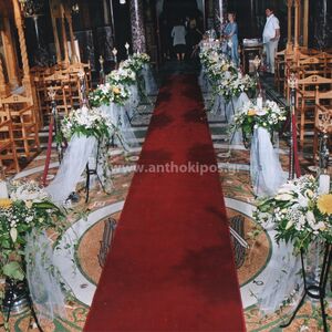 Εσωτερικός Στολισμός Γάμου με πρωτότυπες συνθέσεις με κερί και κισσούς να ρέουν