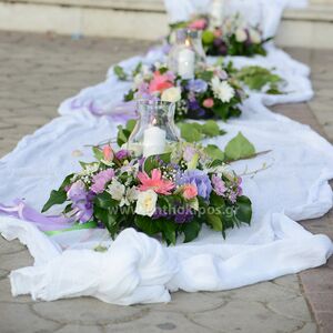 Εξωτερικός Στολισμός Γάμου με υφάσματα και μοναδικές συνθέσεις λουλουδιών με κερί