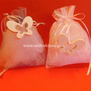 Christening bonbonniere with organza pouch together with wooden butterfly
