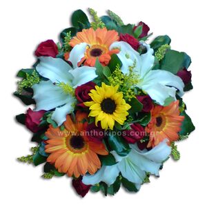 Flower arrangenent with roses, gerberes, oriental and import folliages