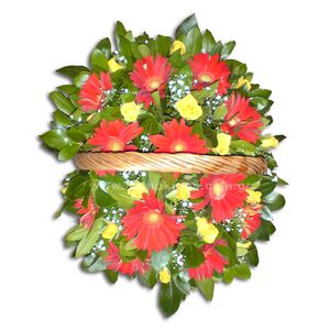 Flower arrangement in red-yellow color in basket with handle