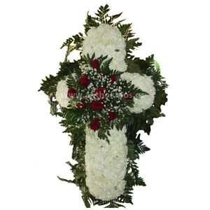Funeral flowers cross with carnations and red roses