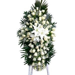 Funeral flowers cross with roses