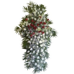 Funeral flowers cross with white roses