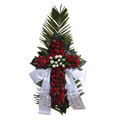 Funeral flowers cross with red roses