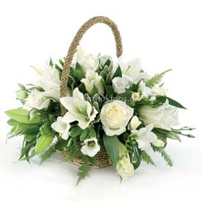 Flowers in a basket in white shade for funeral