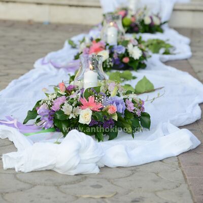 Εξωτερικός Στολισμός Γάμου με υφάσματα και μοναδικές συνθέσεις λουλουδιών με κερί