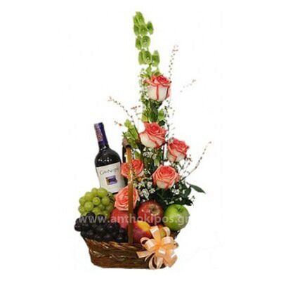 Flower arrangement with drink and fruits
