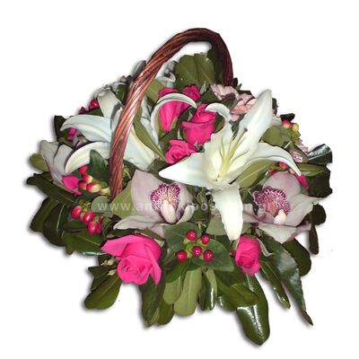 Flower arrangement in white-fuchsia shade in basket with handle