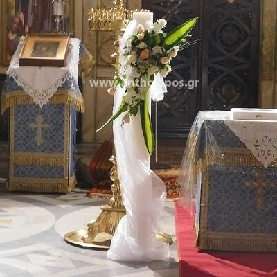 Wedding Candles with pal flowers and import foliages