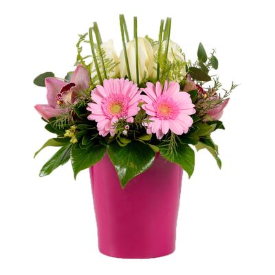 Pink flower arrangement in ceramic pot