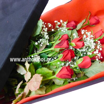 Red roses in black box