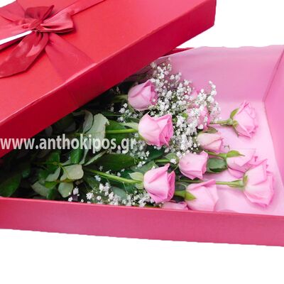 Pink roses in red box