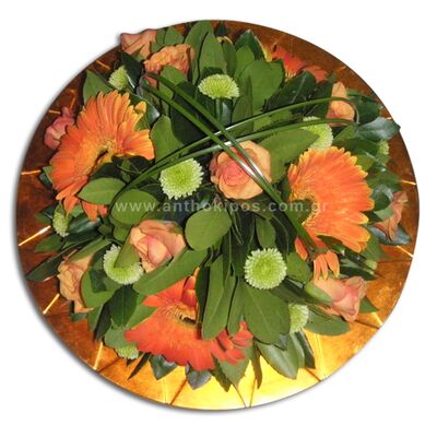 Flower arrangement in platter for table