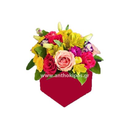 Colorful flower arrangement in red square box