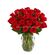 Μπουκέτο με κόκκινα τριαντάφυλλα σε γυάλινο βάζο
