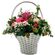 Basket with pink season flowers