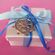 Wedding Favors, box with blue ribbons tied silver helm