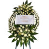 Funeral wreath wheel on Tripod with two white compositions