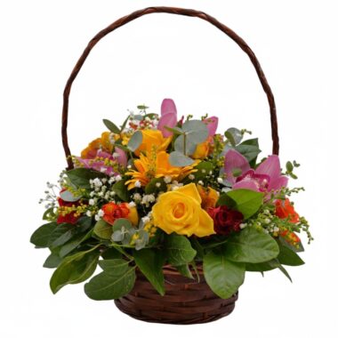 Basket with colorful season flowers
