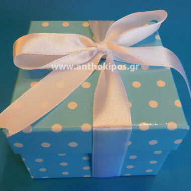 Christening bonbonniere with polka dot blue box and satin ribbon