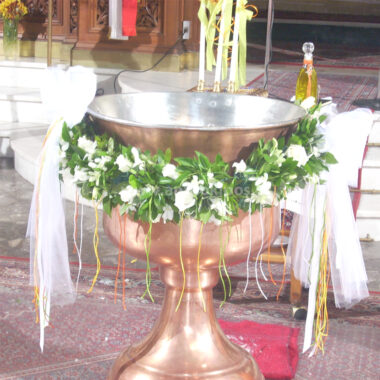 Baptism For Boy with garland with colorful ribbons