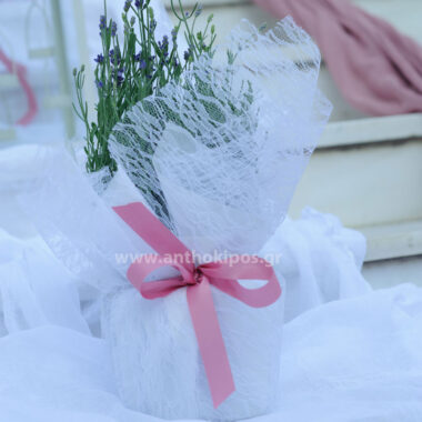 Christening for a Girl with lavender uniquely wrapped with lace