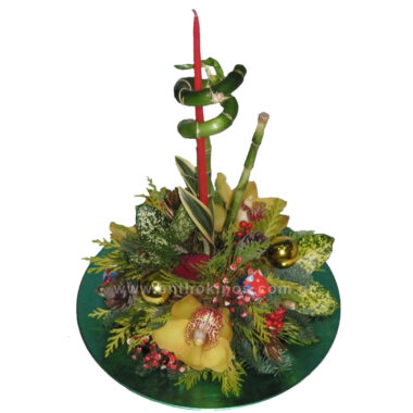 Christmas - New Year flower arrangement round on plate