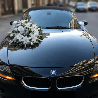 Decoration Of The Wedding Car in white and silver shades