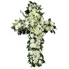 Funeral cross with lilies and roses
