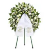 Funeral wreath with lilies roses and chrysanthemums on Tripod