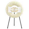 Funeral flower wreath on Tripod wheel